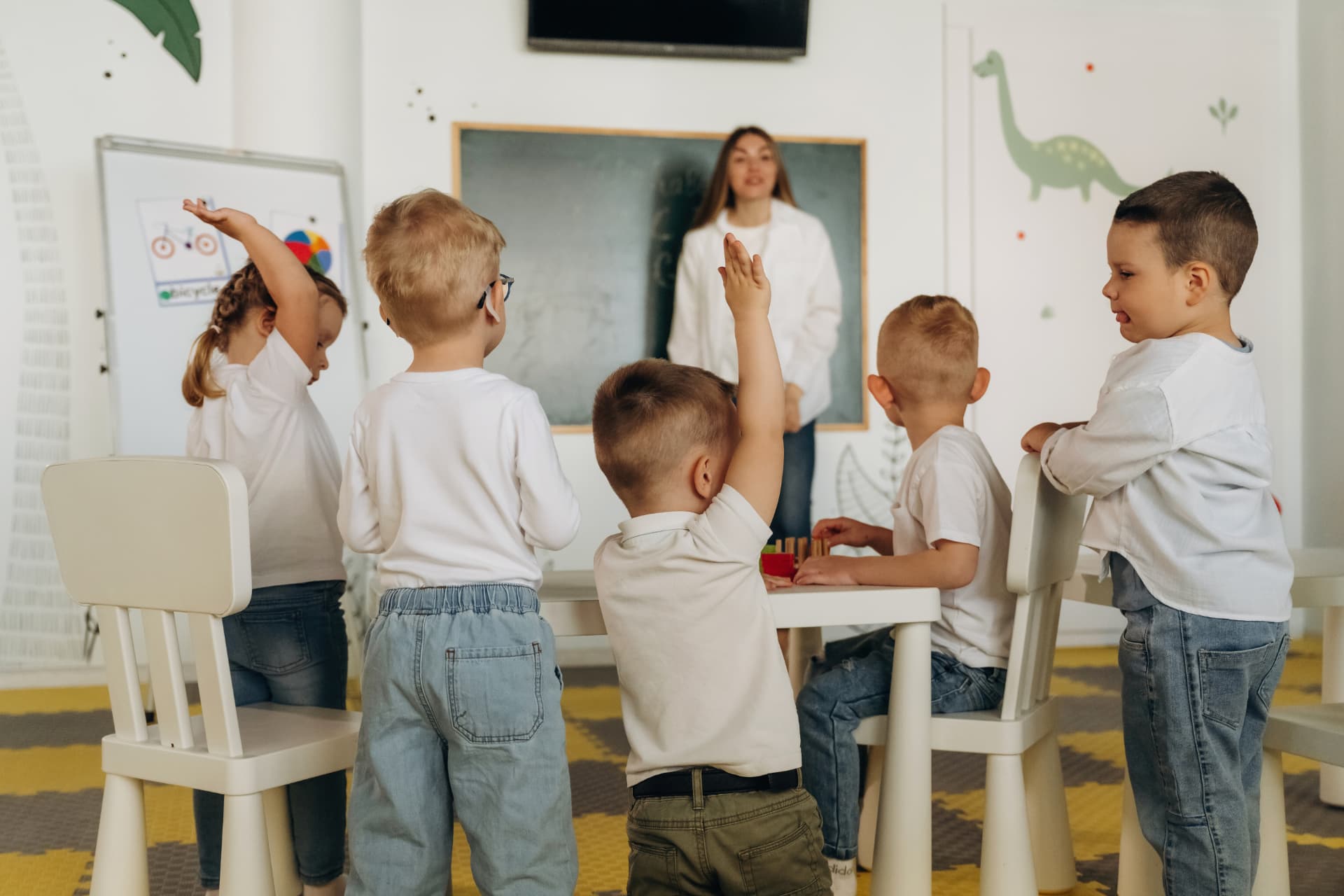 Young students learning together in a classroom